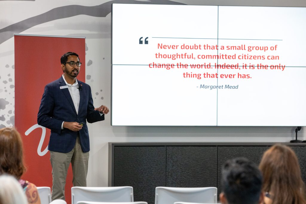 A photo of Nipuna Ambanpola speaking to a group